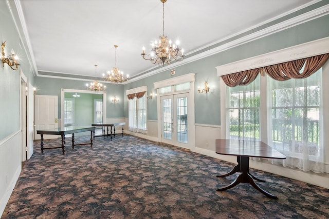 interior space with crown molding, an inviting chandelier, and french doors