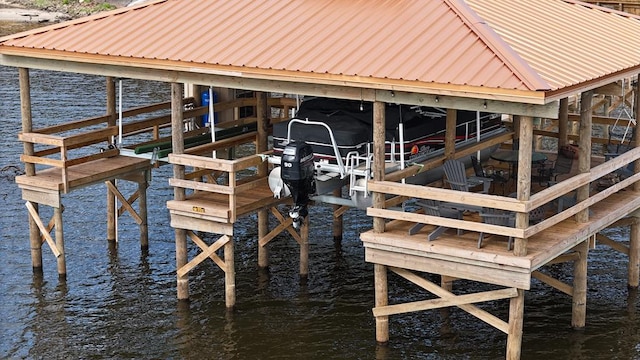 view of dock with a water view