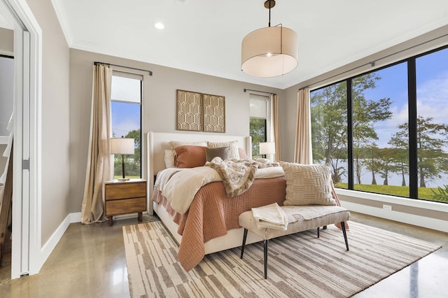 bedroom with crown molding and concrete flooring