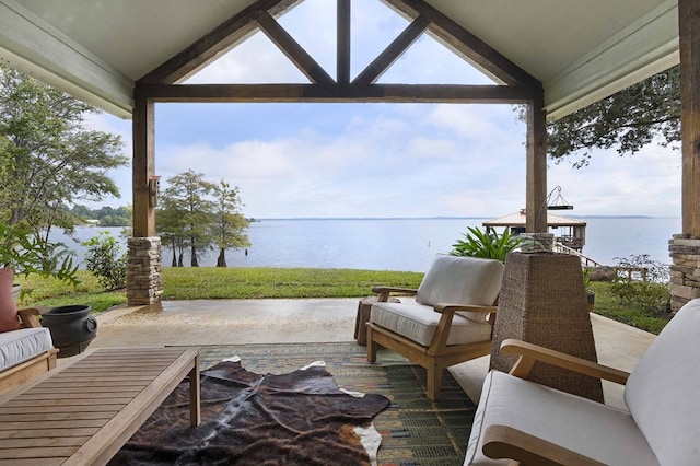 view of patio with a water view