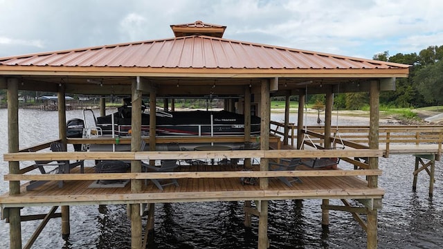 view of dock with a water view