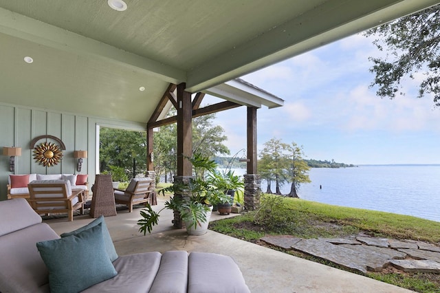 view of patio / terrace with a water view and an outdoor hangout area