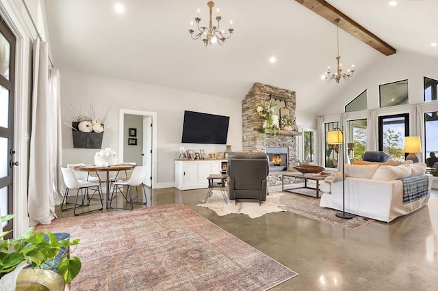 living room featuring beam ceiling, a fireplace, concrete floors, and a chandelier