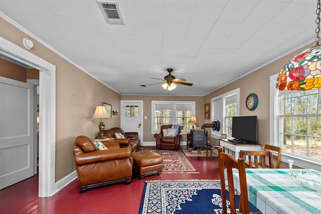 living room with ceiling fan and ornamental molding