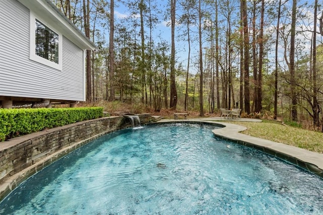 view of pool featuring pool water feature