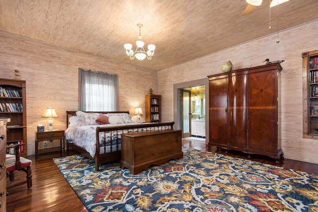 bedroom featuring dark hardwood / wood-style floors, wood ceiling, connected bathroom, and an inviting chandelier