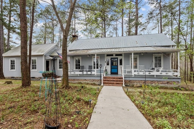 view of front of home featuring covered porch