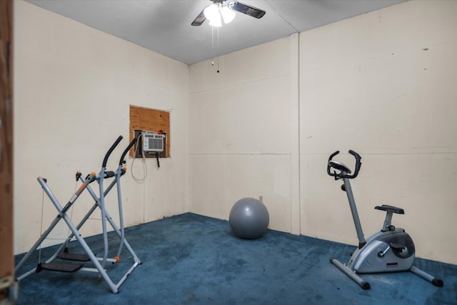 exercise room featuring dark colored carpet, ceiling fan, and cooling unit