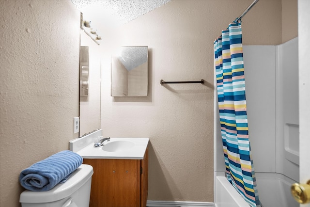 full bathroom with a textured ceiling, vanity, toilet, and shower / bath combo with shower curtain