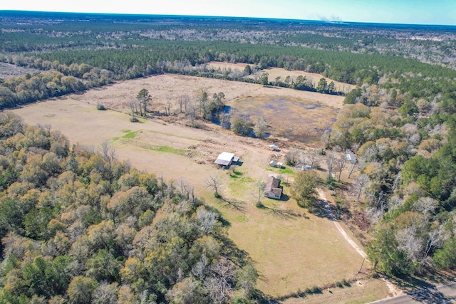 drone / aerial view with a rural view and a forest view