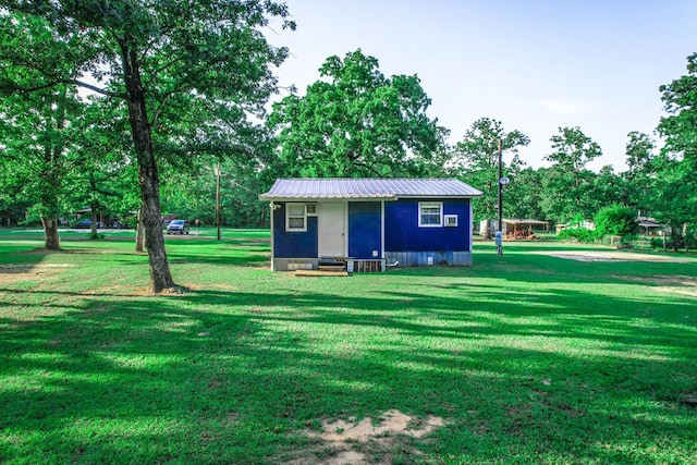 496 County Road 486, Broaddus, TX 75929 - view of outbuilding featuring view of wooded area