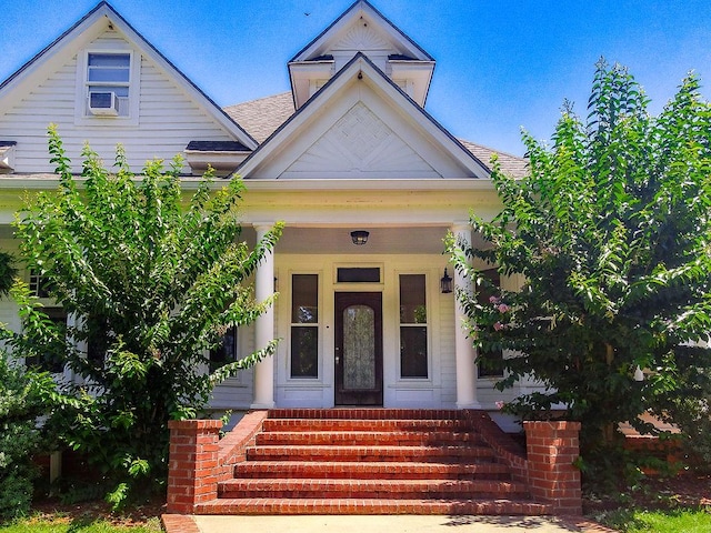 view of front of property featuring covered porch