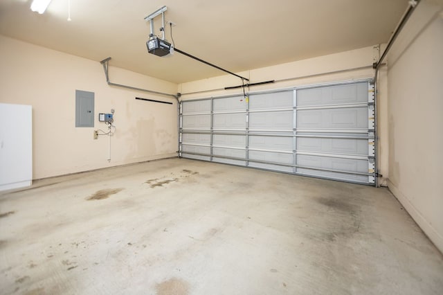120 Shady Springs Bnd, Lufkin, TX 75901 - garage featuring electric panel and a garage door opener