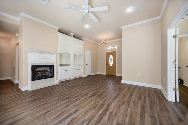 120 Shady Springs Bnd, Lufkin, TX 75901 - unfurnished living room with dark wood-style floors, ceiling fan, a high end fireplace, a chandelier, and crown molding