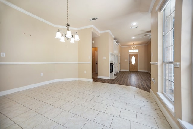 120 Shady Springs Bnd, Lufkin, TX 75901 - foyer with a chandelier, ornamental molding, ceiling fan, light tile patterned floors, and recessed lighting