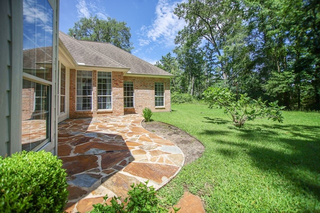 120 Shady Springs Bnd, Lufkin, TX 75901 - view of green lawn featuring a patio