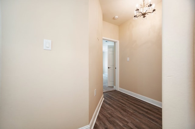 120 Shady Springs Bnd, Lufkin, TX 75901 - corridor featuring dark wood finished floors and a chandelier