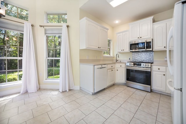 120 Shady Springs Bnd, Lufkin, TX 75901 - kitchen with appliances with stainless steel finishes, healthy amount of natural light, and light countertops