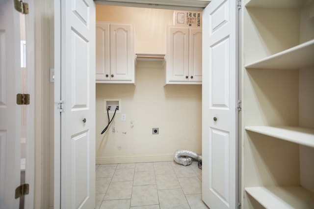 120 Shady Springs Bnd, Lufkin, TX 75901 - laundry room featuring cabinet space, hookup for an electric dryer, hookup for a washing machine, and light tile patterned flooring