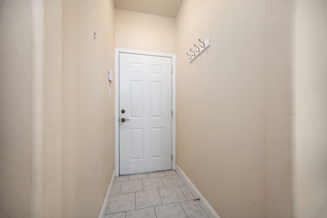 120 Shady Springs Bnd, Lufkin, TX 75901 - doorway with baseboards and light tile patterned flooring