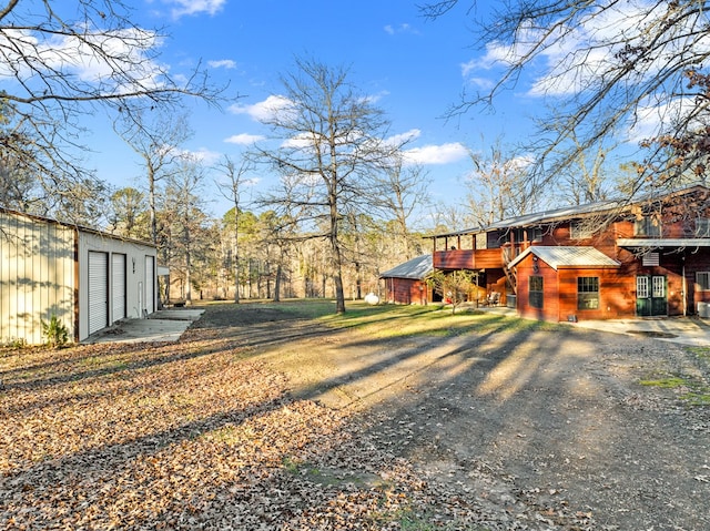 view of yard featuring a garage