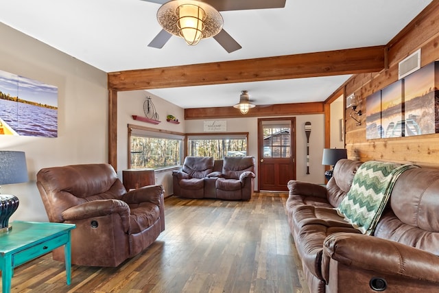 living room with ceiling fan and wood-type flooring