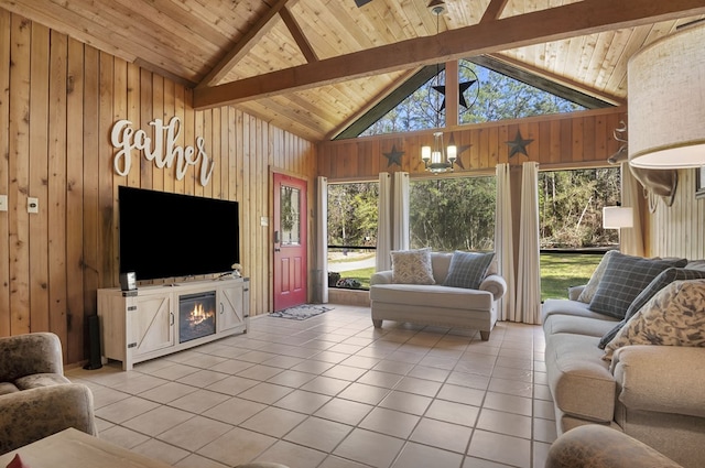 living room with beam ceiling, tile patterned flooring, wooden ceiling, and wood walls