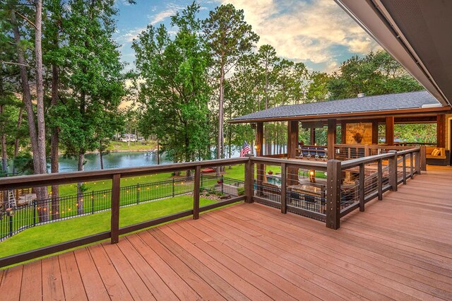 671 Lakeshore Dr, Brookeland, TX 75931 - wooden deck featuring a water view and view of scattered trees