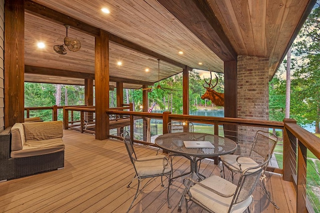 671 Lakeshore Dr, Brookeland, TX 75931 - wooden terrace with outdoor dining area