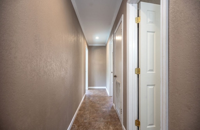 corridor featuring ornamental molding