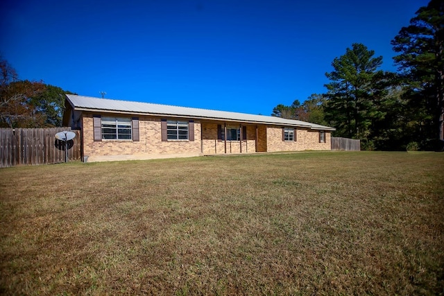 view of front of property with a front lawn