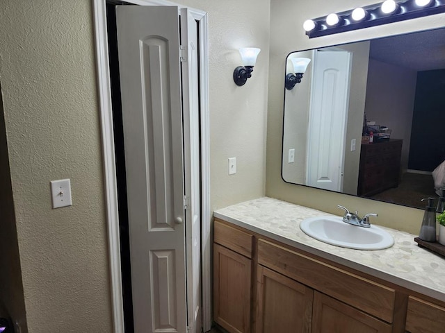 1805 Hanks St, Lufkin, TX 75904 - bathroom featuring vanity and a textured wall