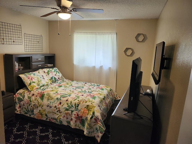 1805 Hanks St, Lufkin, TX 75904 - bedroom featuring a textured ceiling and a ceiling fan