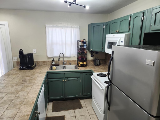 1805 Hanks St, Lufkin, TX 75904 - kitchen with freestanding refrigerator, electric stove, tile countertops, green cabinets, and light tile patterned flooring