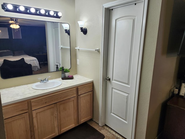 1805 Hanks St, Lufkin, TX 75904 - ensuite bathroom with ceiling fan and vanity