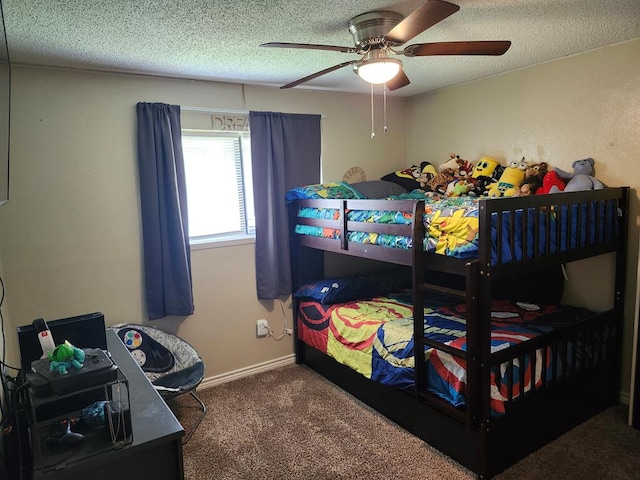 1805 Hanks St, Lufkin, TX 75904 - carpeted bedroom featuring a textured ceiling and a ceiling fan