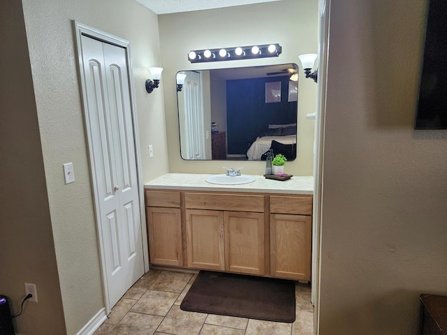 1805 Hanks St, Lufkin, TX 75904 - bathroom with vanity, ensuite bathroom, and tile patterned floors