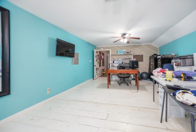 310 Karen Dr, Lufkin, TX 75904 - office area with visible vents, lofted ceiling, a ceiling fan, wood walls, and wood finished floors