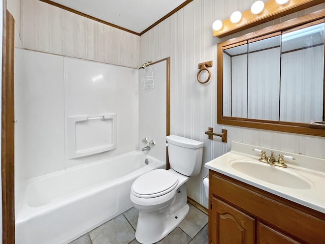 33963 US Highway 96, Buna, TX 77612 - bathroom featuring vanity, ornamental molding, tile patterned floors, toilet, and tub / shower combination