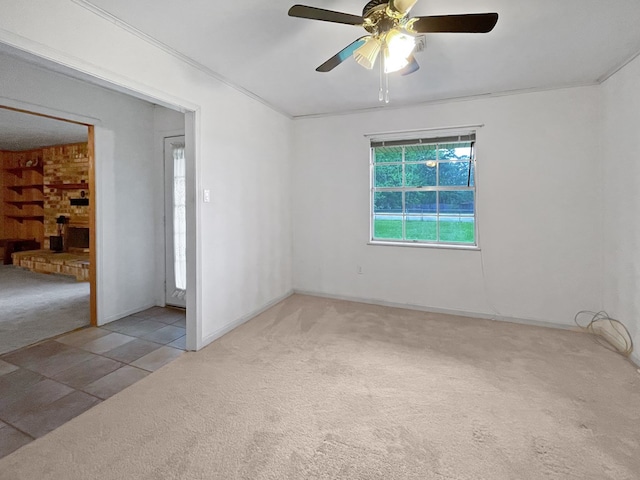33963 US Highway 96, Buna, TX 77612 - unfurnished room with baseboards, a ceiling fan, and carpet flooring