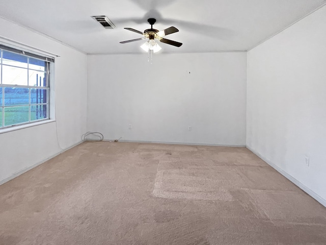 33963 US Highway 96, Buna, TX 77612 - unfurnished room with a ceiling fan, baseboards, carpet, and visible vents