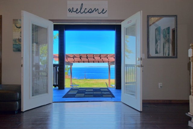 entryway with french doors and dark hardwood / wood-style floors