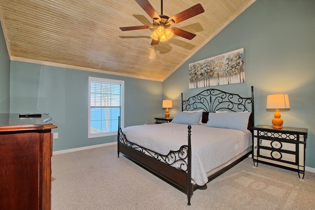 carpeted bedroom featuring ceiling fan, crown molding, wooden ceiling, and vaulted ceiling