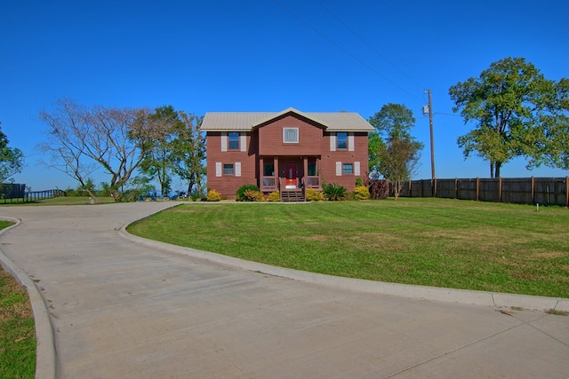 view of front of house featuring a front lawn and a porch