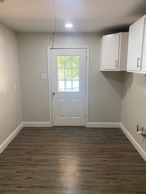 interior space with dark wood-type flooring