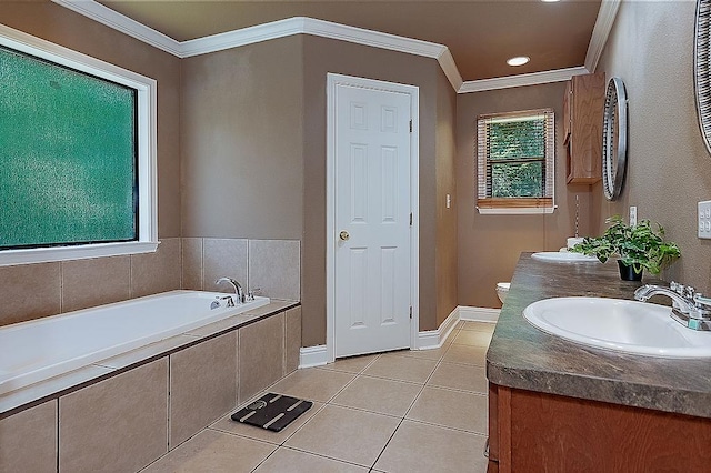 bathroom featuring vanity, crown molding, a relaxing tiled tub, tile patterned flooring, and toilet