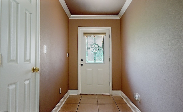 entryway with light tile patterned flooring and ornamental molding