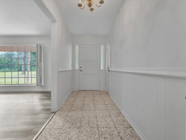 200 Platt Rd, Lufkin, TX 75904 - hallway featuring baseboards and a chandelier