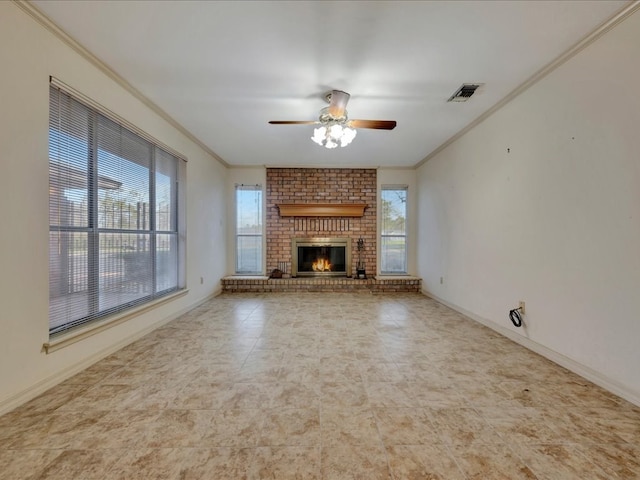 unfurnished living room featuring visible vents, ornamental molding, a healthy amount of sunlight, and a ceiling fan