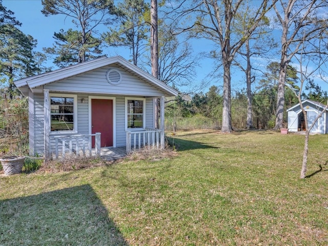 view of shed featuring a porch
